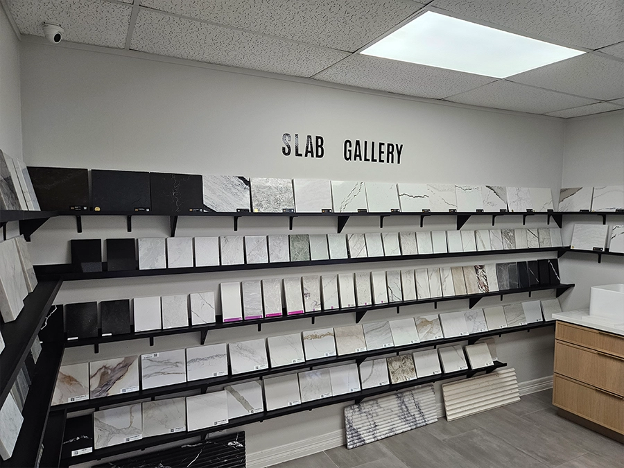 Countertop slab samples arranged in the Unique BKB showroom gallery